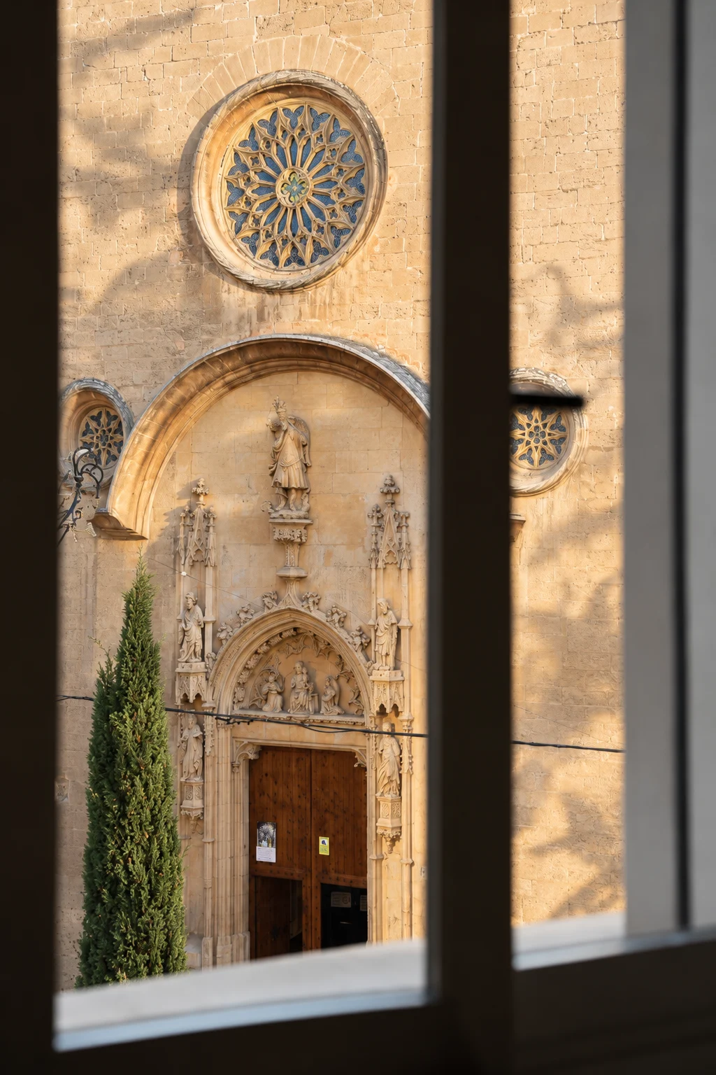 View of the church of Sant Miquel in Palma from a studio window